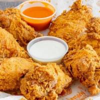 Chicken Wings - · Made to order freshly breaded and fried Bone-in wings served with choice of dust and dipping...
