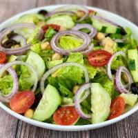 House Salad - · Romaine, red onions, grape tomatoes, cucumbers and black olives. Served with  garlic bread