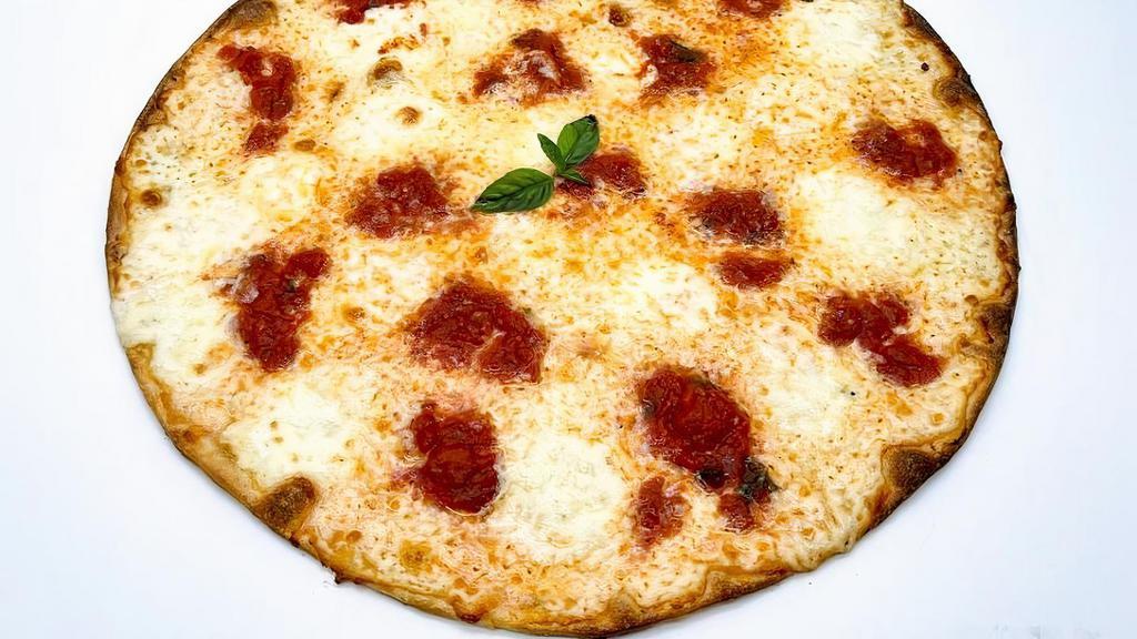 Margherita Pizza · Plum tomato sauce, fresh Mozzarella, fresh basil, Parmesan, and extra virgin olive oil.