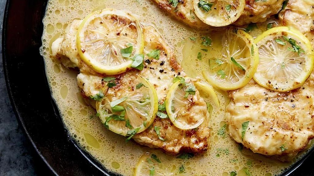 Chicken Francese · Egg battered chicken sauteed in white wine, lemon, and butter, topped with parsley.