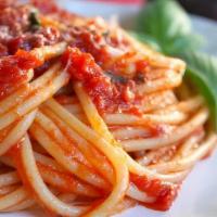 Pasta Tomato Sauce · Served with garlic bread
