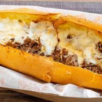 Philly Cheesesteak · Thinly sliced Ribeye steak with cheese, served with choice of grilled onions, peppers and mu...