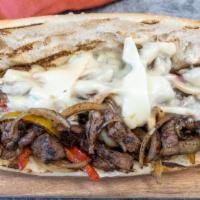 The Steak & Cheese · House marinated sirloin steak tips with sautéed peppers and onions and melted white American.