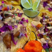 3 Baja Seafood Tacos · Your choice of fried battered or grilled fish or shrimp, topped with pickled red cabbage, pi...
