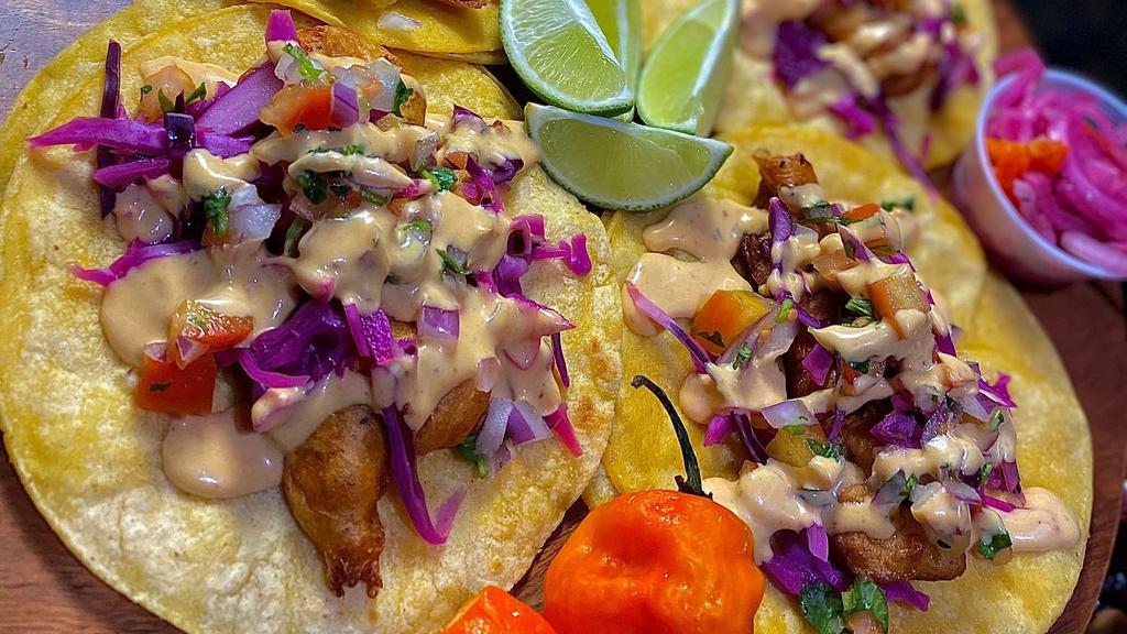 3 Baja Seafood Tacos · Your choice of fried battered or grilled fish or shrimp, topped with pickled red cabbage, pico de gallo and our homemade seafood dressing.