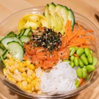 Spicy Salmon Poke · Pickled daikon, red onion, seaweed salad, edamame, crab meat, microgreens, shredded nori, ch...