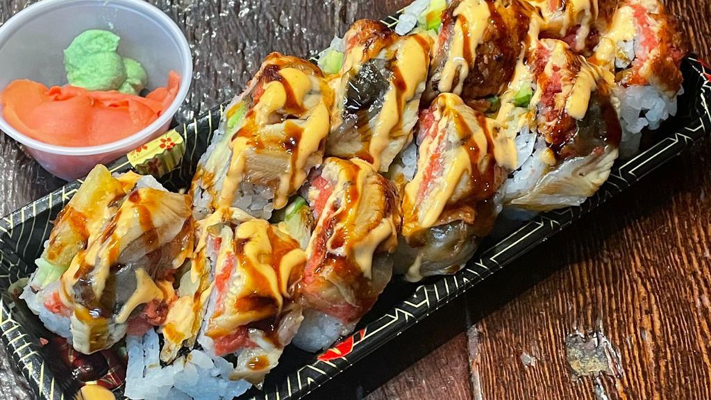 Crazy Roll · Shrimp Tempura, Crab Meat, Avocado, Topped with Spicy Tuna and Eel, Eel Sauce and Spicy Mayo.