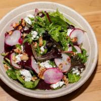 Insalata Di Barbabietole Rosse · Mixed greens with beets, goat cheese, roasted walnuts & sliced radish