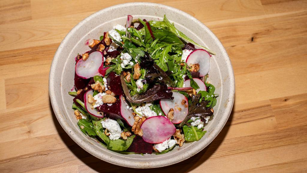 Insalata Di Barbabietole Rosse · Mixed greens with beets, goat cheese, roasted walnuts & sliced radish