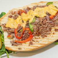 Philly Cheese Steak Wrap · With onions, green peppers and cheese.