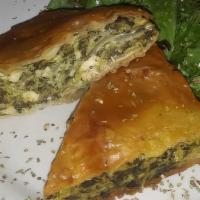 Spanakopita · Fresh spinach and feta cheese baked in phyllo dough.