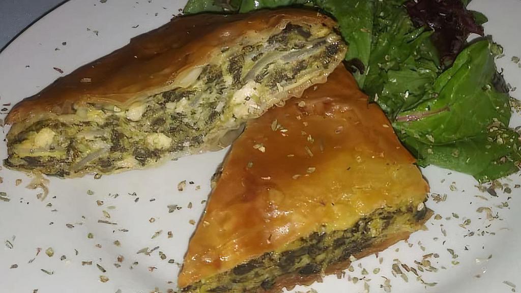 Spanakopita · Fresh spinach and feta cheese baked in phyllo dough.