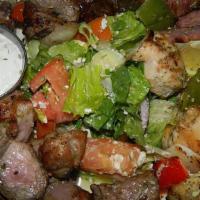 Athenian Meat Platter · Includes chicken kebob, gyro, pork kebob and lukaniko. Served with Greek salad and tzatziki ...