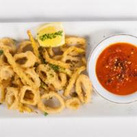 Calamaretti E Zucchine Fritti Con Pomodoro Piccante · Fried Calamari and Zucchini Served with a Spiced Tomato Sauce.