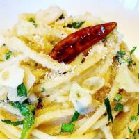 Spaghetti Aglio E Oilio  · Anchovies and Hot Pepper in Garlic and Oil.