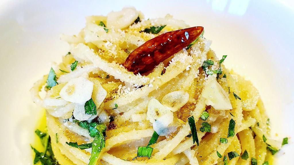 Spaghetti Aglio E Oilio  · Anchovies and Hot Pepper in Garlic and Oil.