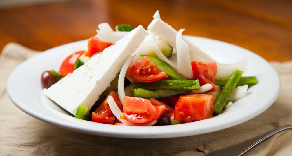 1/2 Greek Salad Tray · Vine ripe tomatoes, onions, cucumbers, peppers, feta cheese, olives, oregano and olive oil.