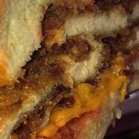 The Westchester Sandwich · Chicken cutlet, bacon with melted cheddar, and BBQ sauce. Served with choice of bread.