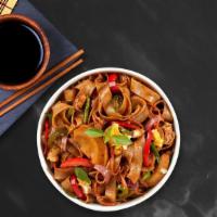 Pad Kee Mao · Wok-fried flat noodle, bell pepper, basil, chili with vegan Thai spicy brown sauce.