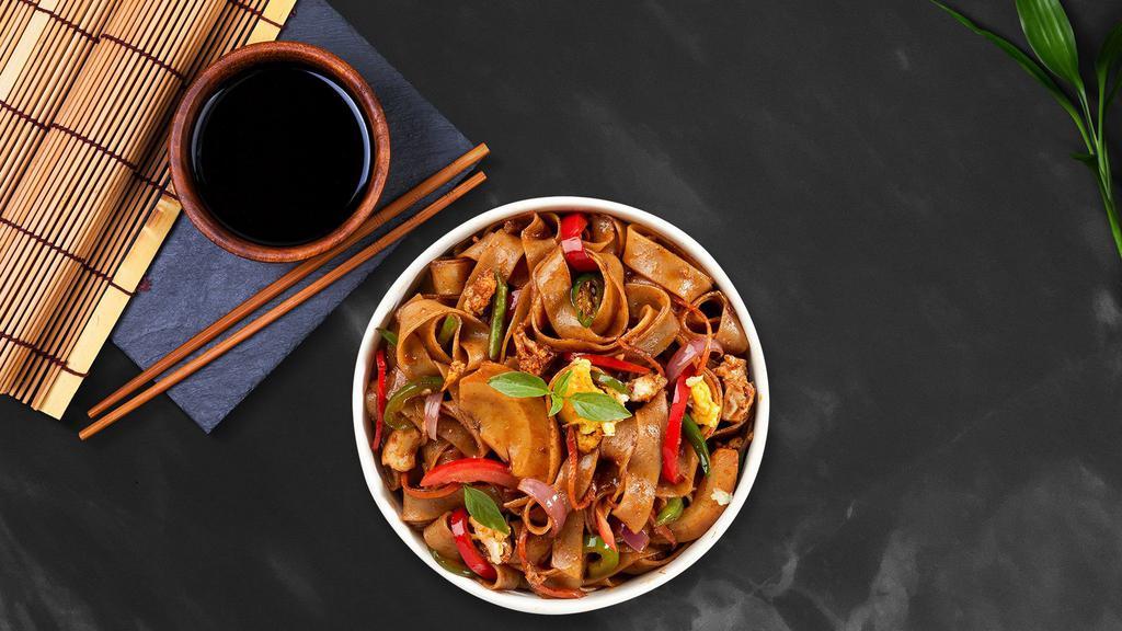 Pad Kee Mao · Wok-fried flat noodle, bell pepper, basil, chili with vegan Thai spicy brown sauce.