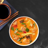 Panang Pit Curry Bowl · Red curry paste with coconut milk, bell peppers, onions, basil and your choice of protein on...