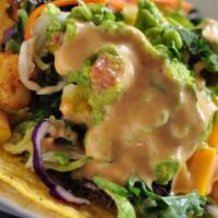 The Shrimpy Taco · Both hard and soft shell taco melted together with cheese, guacamole, mango & pineapple sals...