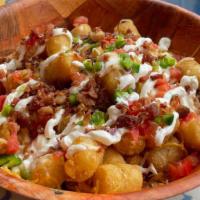 Loaded Tater Tots · Tater tots with black beans, queso, monterey jack/cheddar cheese, pico de gallo, jalapenos a...