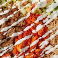 Mix Over Rice · Platters with rice. Toppings to choose from, lettuce, cucumbers, tomatoes, onions, green pep...