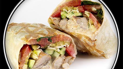Classic Wrap · Favorite. Wrap (white), chicken, pickle, fresh cucumber and tomato, cabbage, garlic and tomato sauce.