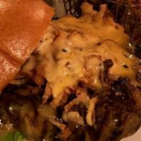 Guinness Stout Burger · With Guinness cheese, whiskey mayonnaise, and tobacco onions.
