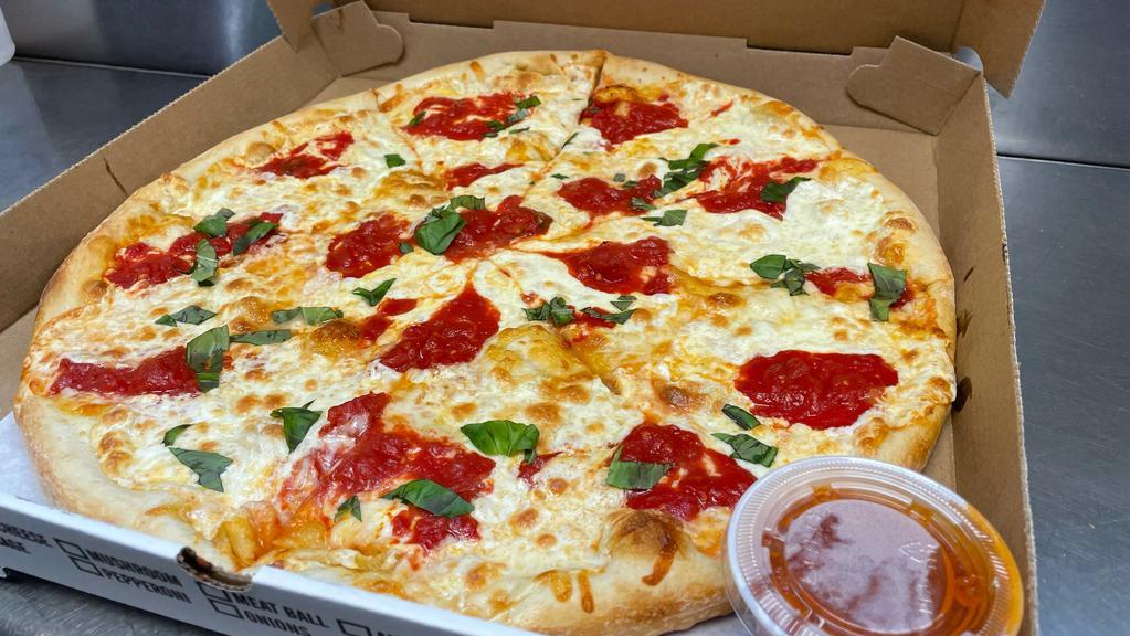 Margherita Pizza · Fresh tomato sauce, Fresh mozzarella & Basil