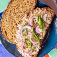 Tuna Salad Sandwich · Rustic bread, tuna, hard boiled egg, onion, basil.