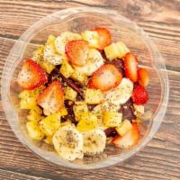 Tropical Acai Bowl · Banana, strawberries, pineapple, blueberries, mango.
