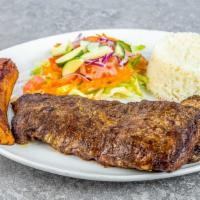 Skirt Steak · Entrana. Served with rice and beans, French fries, and sweet plantains or green plantains. (...