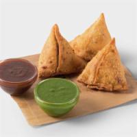 Samosas · 3 crispy pastries filled with potatoes, peas and spices. Served with coriander and tamarind ...