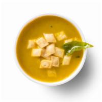 Mulligatawny Soup · A tangy lentil soup made with coconut milk and tamarind. This soup is gluten free if the pap...