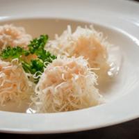 Shumai · Steamed shrimp dumplings.