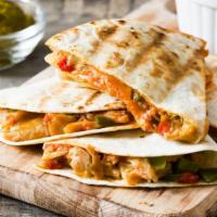Grilled Steak Quesadilla · A large handmade flour tortilla stuffed with grilled steak, a blend of melted cheese, and pi...
