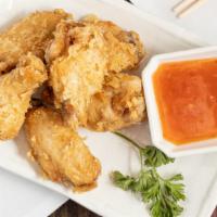 Yummy Chicken Wings (6) · Six pieces. Deep-fried, marinated chicken, and topping with fried onion. Served with sweet c...