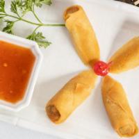 Thai Veggie Spring Roll · Top menu item. Four pieces. Crispy fried Thai vegetable spring rolls served with sweet chili...