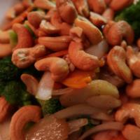 Pad Cashew · Spicy. Stir-fried cashew nuts with white onion, pineapple, carrot, peapod, bell pepper, cele...