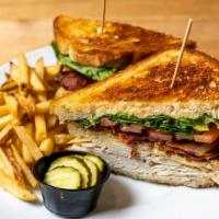 The Clubhouse · Turkey. Hickory bacon, swiss, lettuce, tomato, mayo, toasted sourdough.