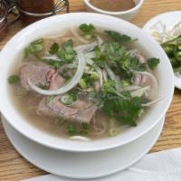 Pho Tai (Medium Beef Pho) · Rice noodle soup with beef (medium cooked beef).