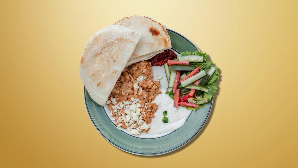 Spiced Chicken Plate · Chicken and beef served with rice or salad, tahini sauce,garlic sauce,spicy house sauce, served on a pita bread and goes along with pickles