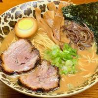 Shoyu Ramen · Pork broth, homemade soy sauce for soup. roasted pork belly, wood ear, bamboo, scallion, and...