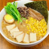 Veggie Miso Ramen · Vegetable broth, miso soy bean sauce with sesame and peanuts butter for soup. Brown tofu wit...