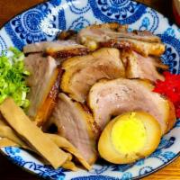 Pork Charshu Don · Sliced tender pork charshu over rice. Our ordinary noodles are made with flour and egg. We r...