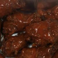 Buffalo Wings · Our halal buffalo wings are breaded and fried and deliciously sassy.  Served with your choic...