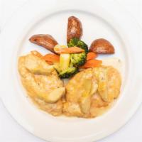 Pollo Martini · Pounded chicken breast lightly breaded in parmigiana and sauteed with shallots, artichoke he...