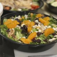 Tropical Salad · Mixed greens, mandarin oranges, cranberries, candied walnuts and Gorgonzola cheese with hous...